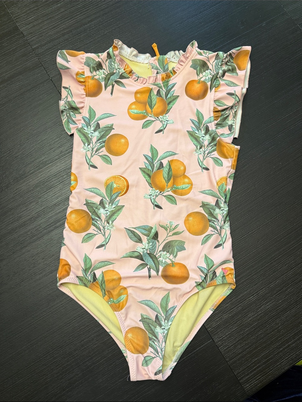 Girls Peachy Orange Print One-Piece Swimsuit